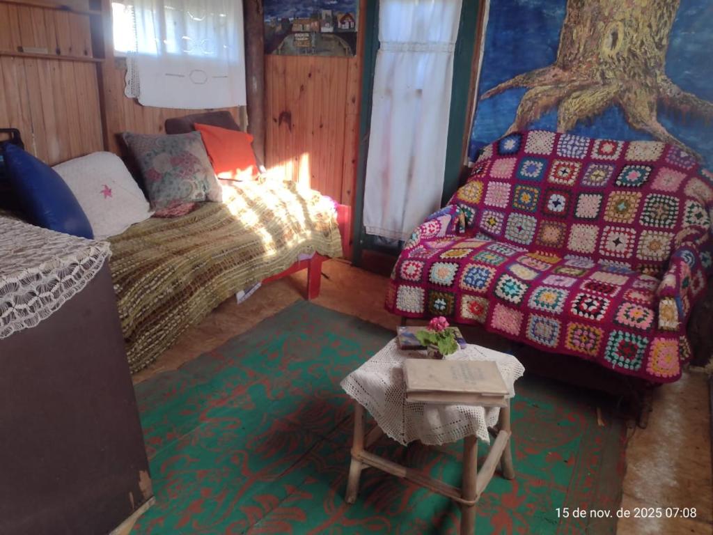 En eller flere senge i et værelse på Cabaña azul