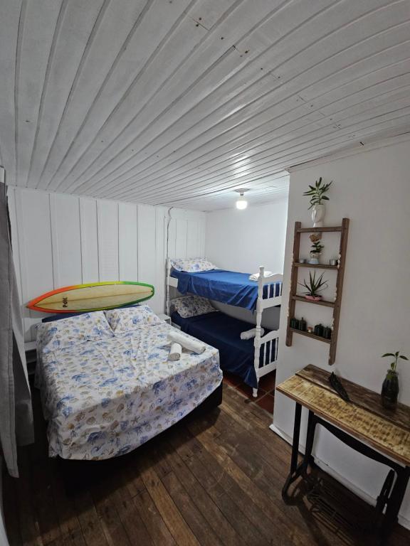 Ένα ή περισσότερα κρεβάτια σε δωμάτιο στο Pousada Nova Brasília Ilha do Mel