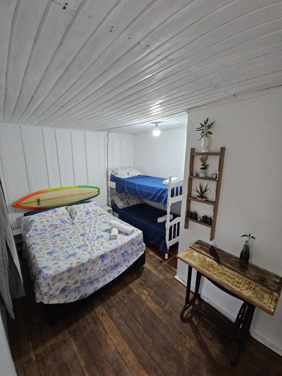 Postel nebo postele na pokoji v ubytování Pousada Nova Brasília Ilha do Mel