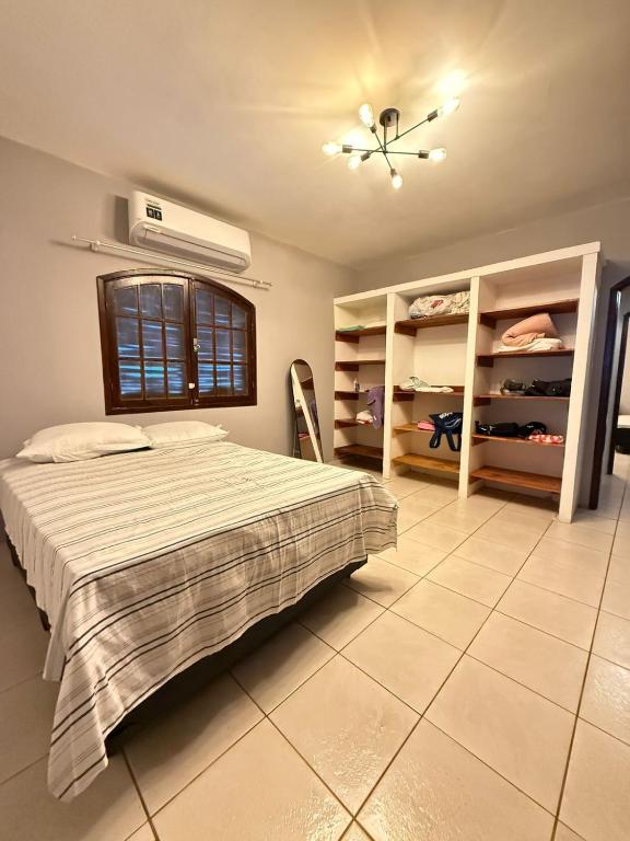 En eller flere senge i et værelse på Casa Dois Amores - Espaço, Lazer e Natureza