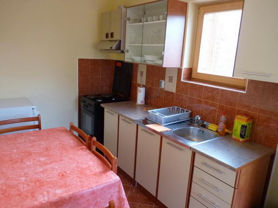 Kuchyňa alebo kuchynka v ubytovaní Apartmani Emily