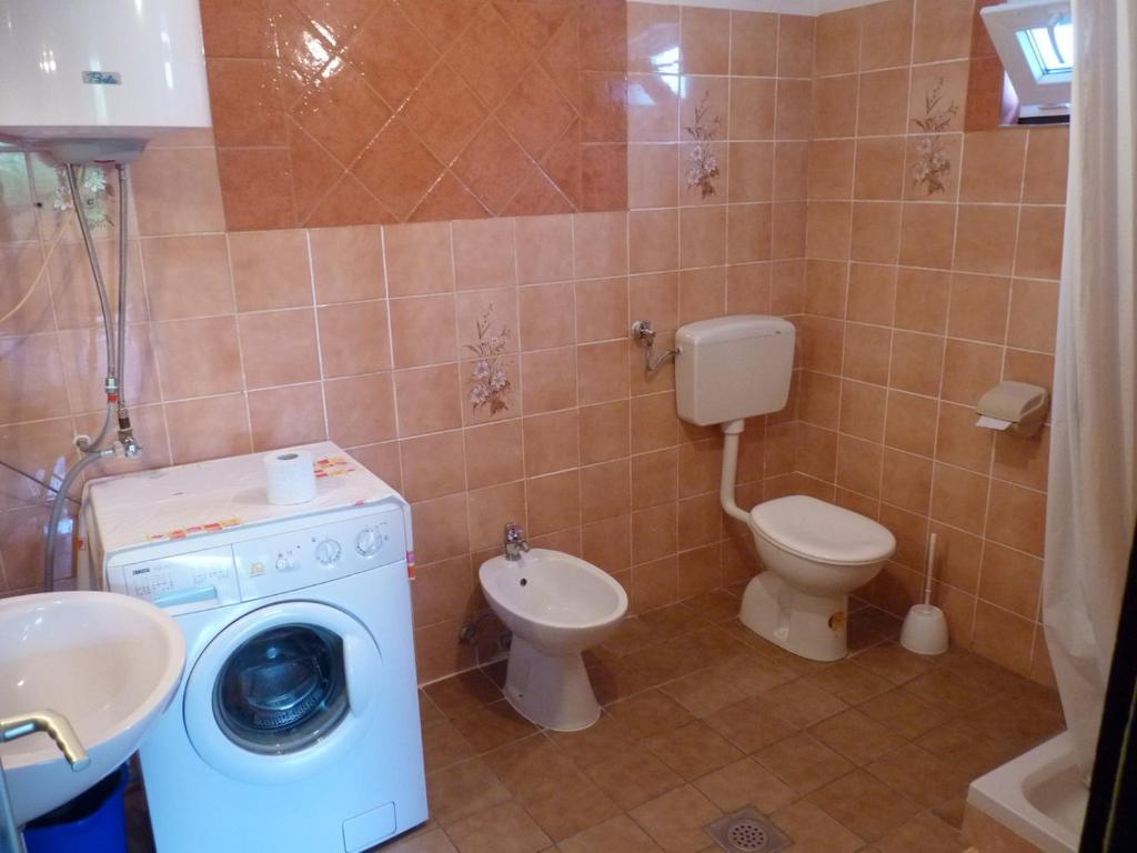 Kúpeľňa v ubytovaní Apartmani Emily
