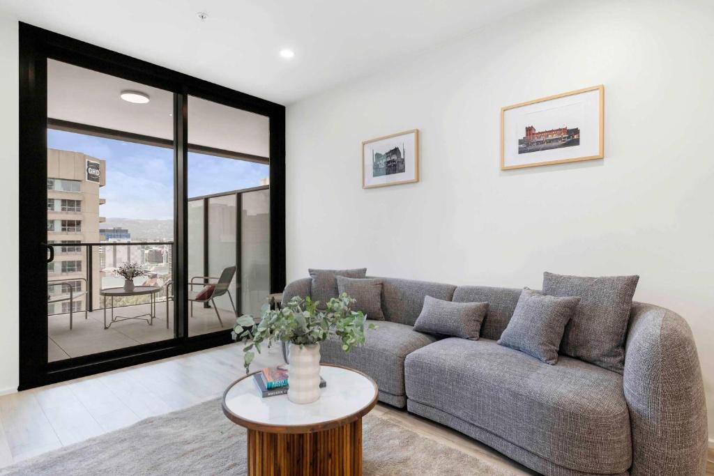 Et opholdsområde på Cloudline City Stay Victoria Tower CBD