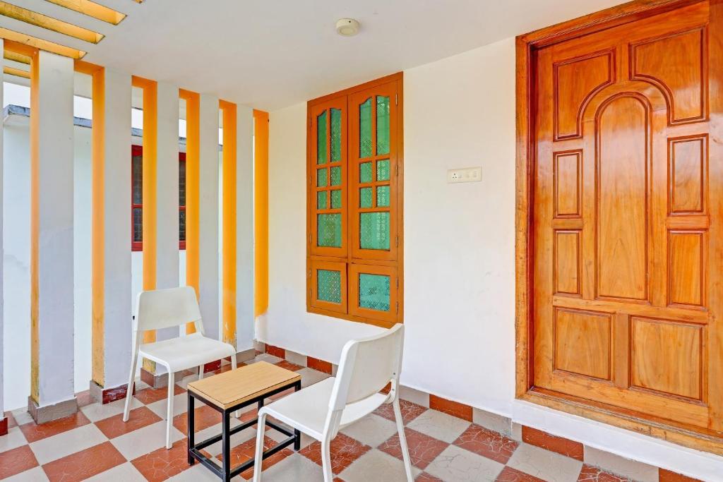 Fotografie z fotogalerie ubytování Capital O Pop Tavern Kazhakkottam v destinaci Trivandrum