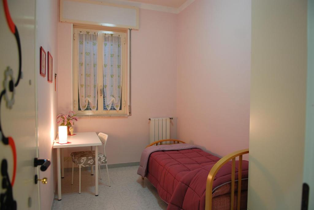 Posteľ alebo postele v izbe v ubytovaní Villa Preziosa