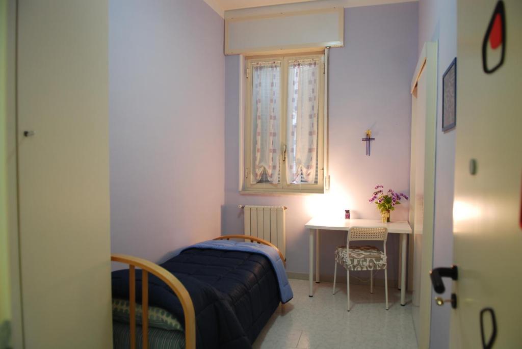 Posteľ alebo postele v izbe v ubytovaní Villa Preziosa