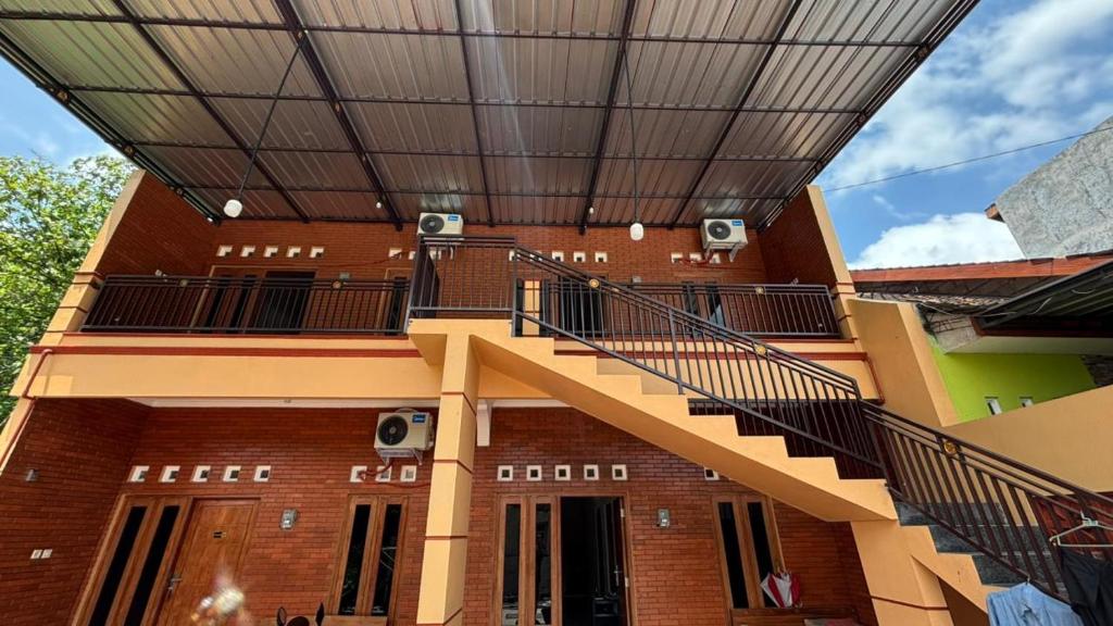 En balkon eller terrasse på Homestay Permana Syariah