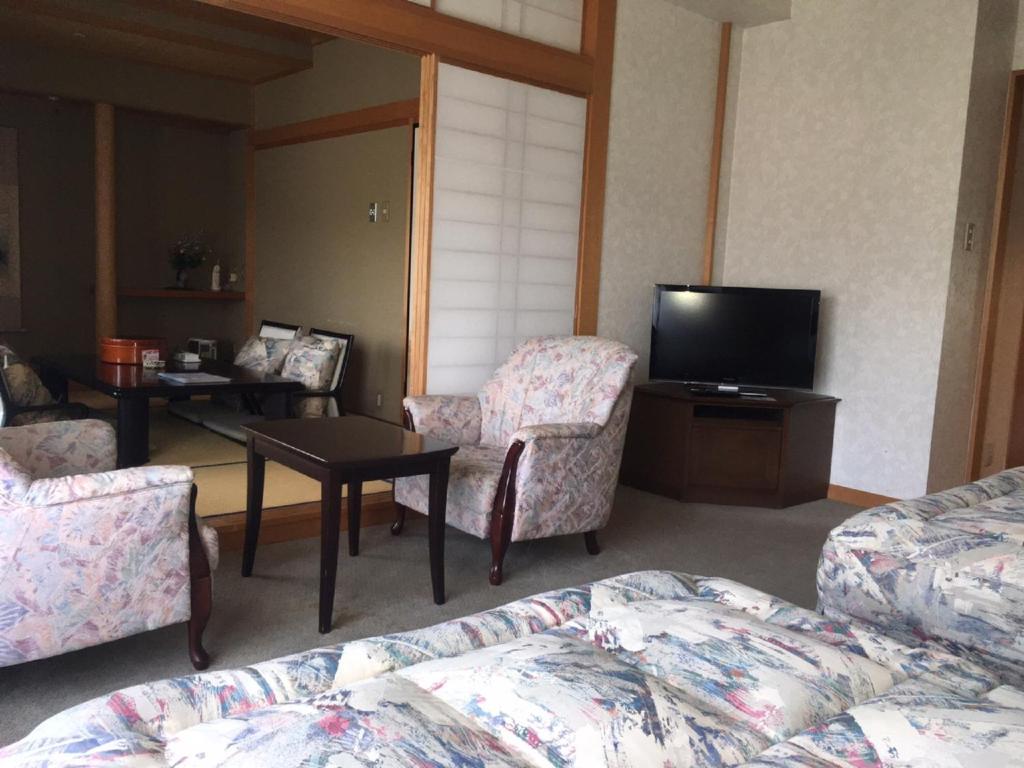Postel nebo postele na pokoji v ubytování Breezbay Hotel & Resort Gero