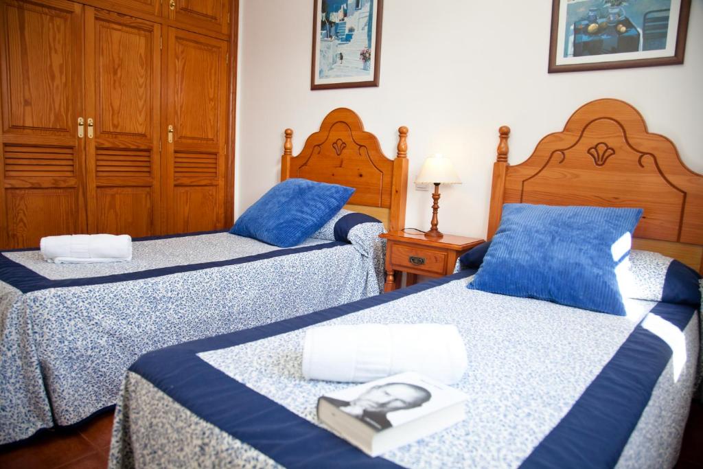 Postel nebo postele na pokoji v ubytování Villas Bocaina Beach