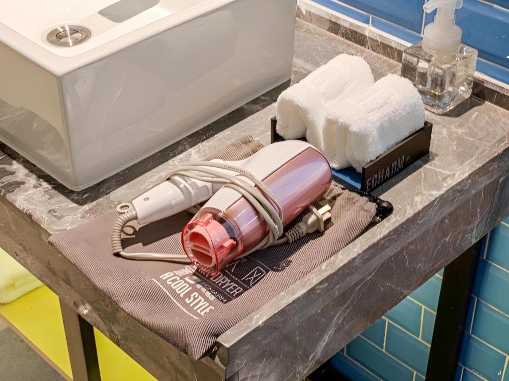 Galería fotográfica de Echarm Hotel Foshan West Station Shishan Luocun en Luocun