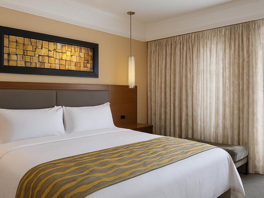 Postel nebo postele na pokoji v ubytování Marriott's Desert Springs Villas I - STUDIO