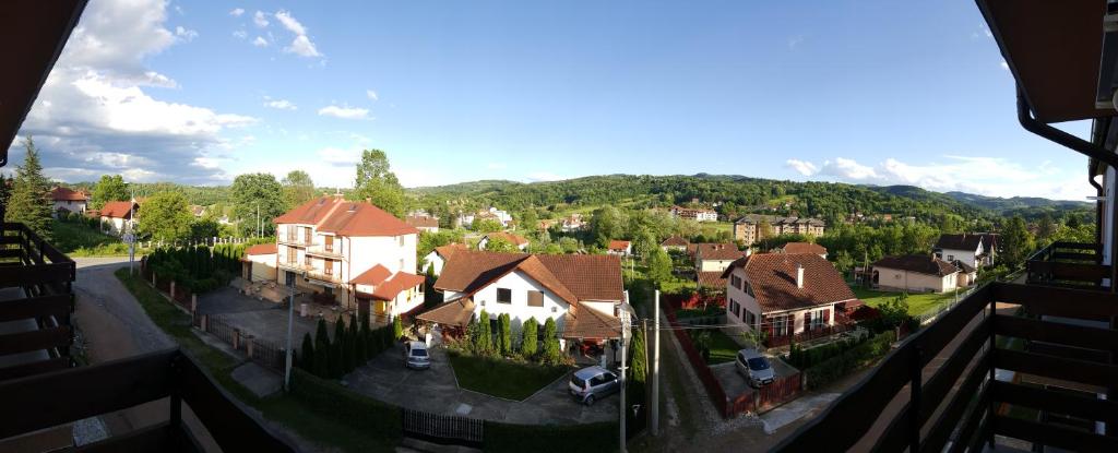 a view of a village with houses and trees at Apartment Krstin Banja Vrujci in Gornja Toplica