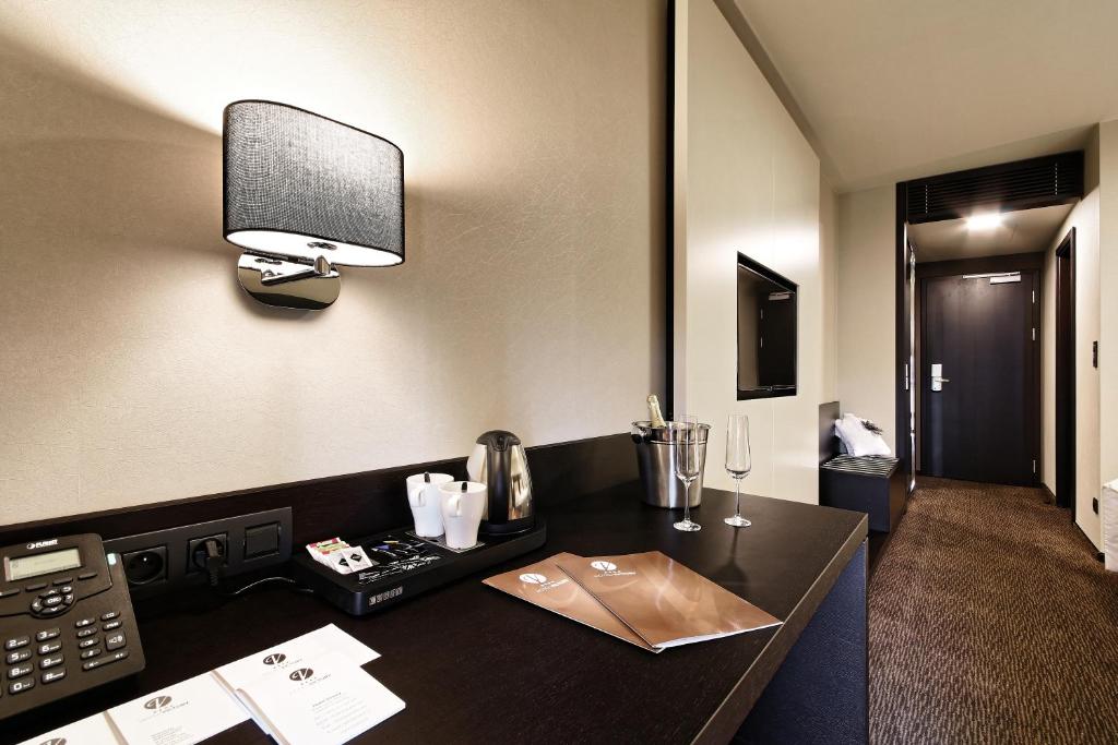 TV a/nebo společenská místnost v ubytování Hotel Victory