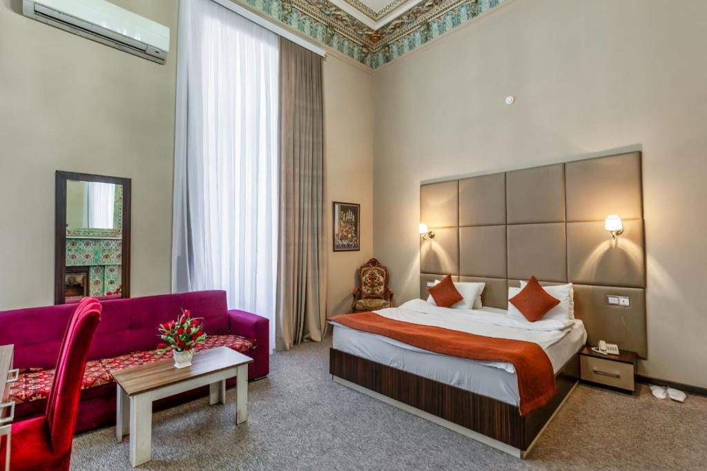 Postel nebo postele na pokoji v ubytování Boutique Garden De Baku