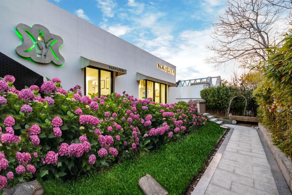 Zahrada ubytování NAYUTA Smart Seaside Homestay