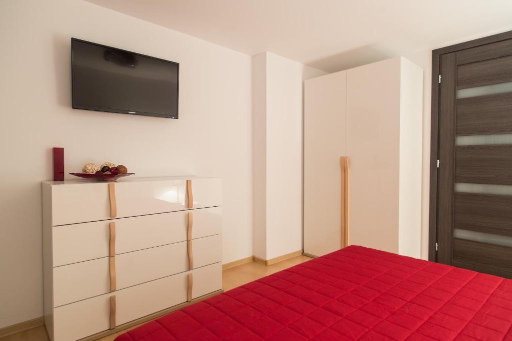 Posteľ alebo postele v izbe v ubytovaní Apartament Zacisze Tatr