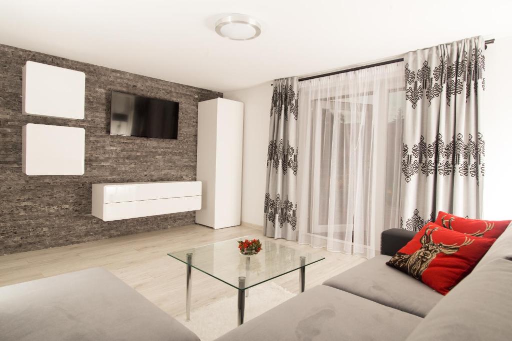 Postel nebo postele na pokoji v ubytování Apartament Zacisze Tatr