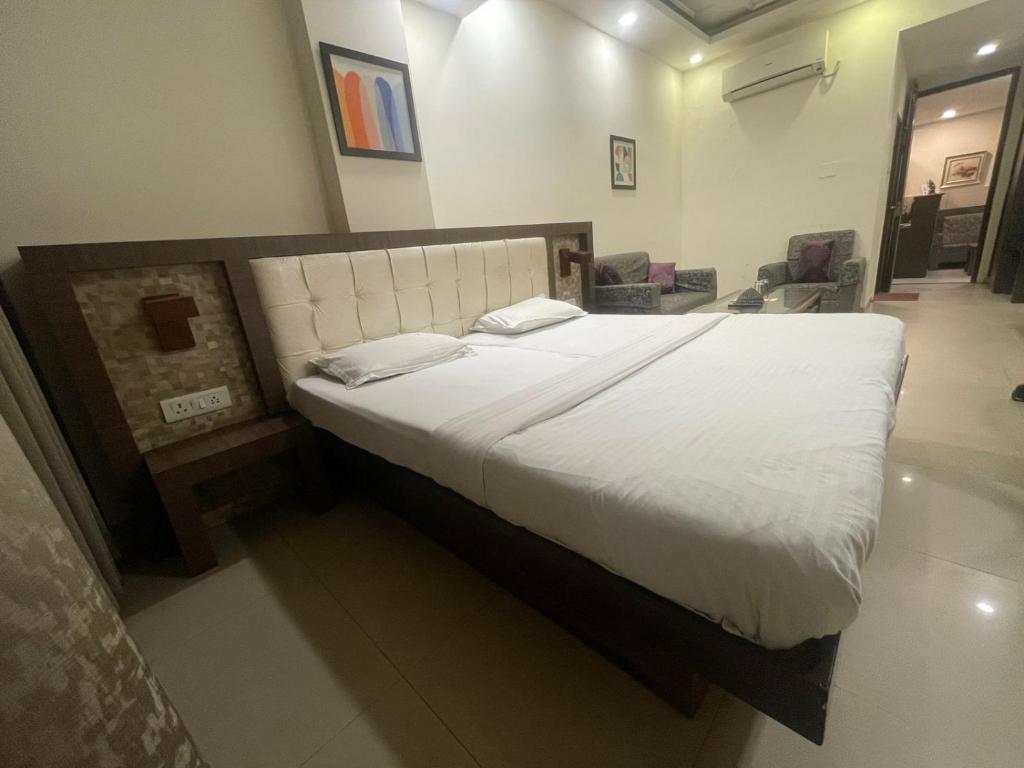 Cama o camas de una habitación en Hotel Solitaire