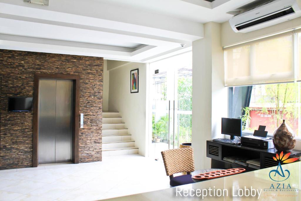 TV a/nebo společenská místnost v ubytování Azia Suites and Residences