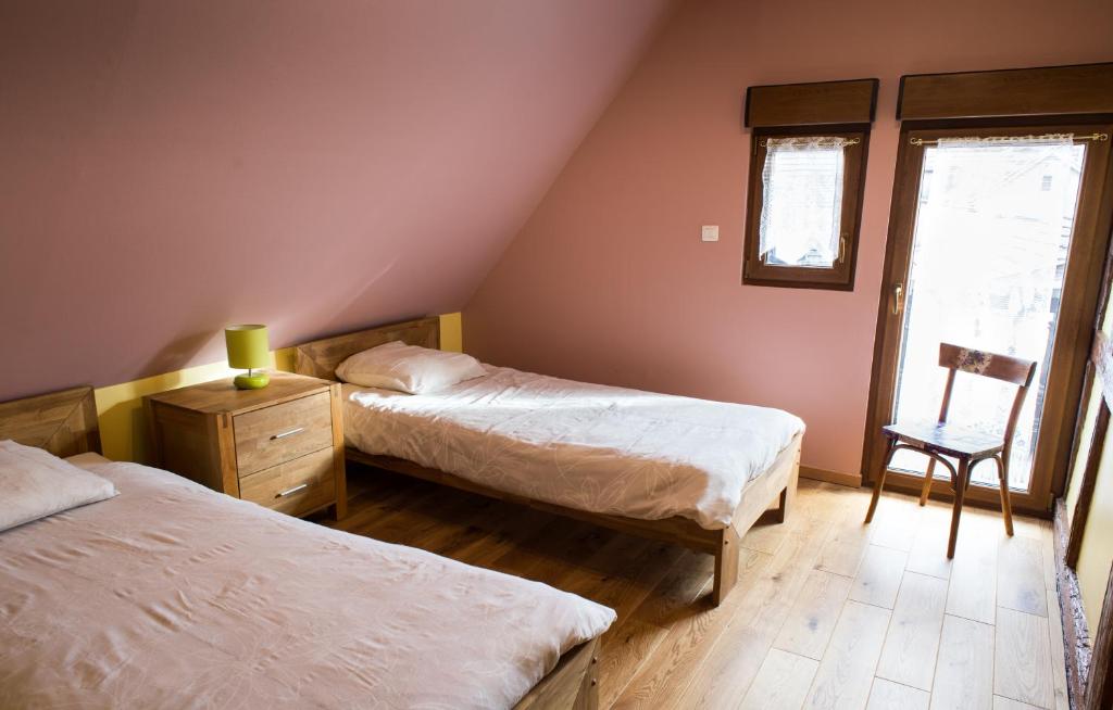Postel nebo postele na pokoji v ubytování Maison A Colombage De 1602
