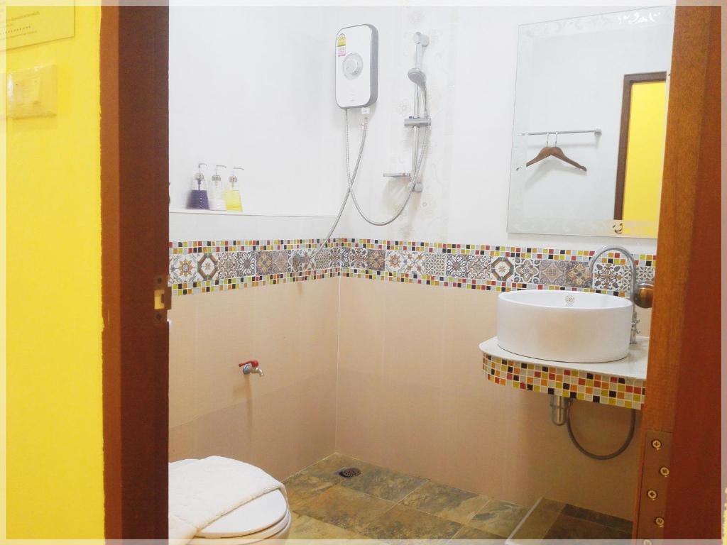 Koupelna v ubytování Baan Bussaba Hotel