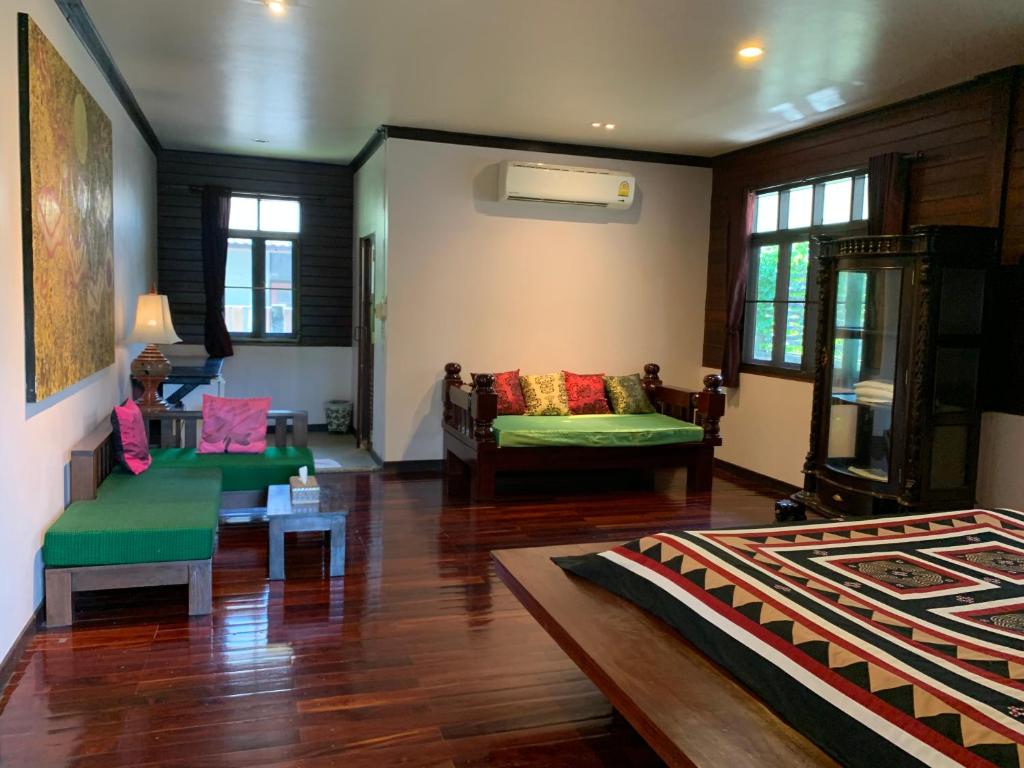 Кровать или кровати в номере Lotus Place Sukhothai