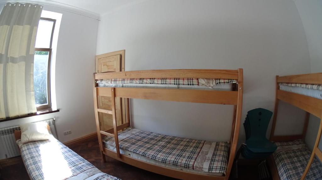 Postel nebo postele na pokoji v ubytování Hostel MIF