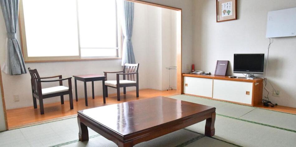 Un televizor și/sau centru de divertisment la 雲海の里かもい岳