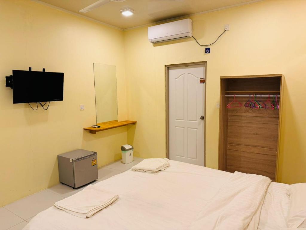 Ένα ή περισσότερα κρεβάτια σε δωμάτιο στο Vegas Thoddoo Maldives Extension