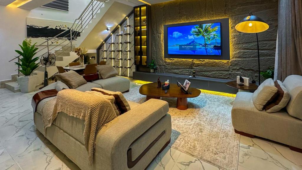 Χώρος καθιστικού στο Nex Home Apartment