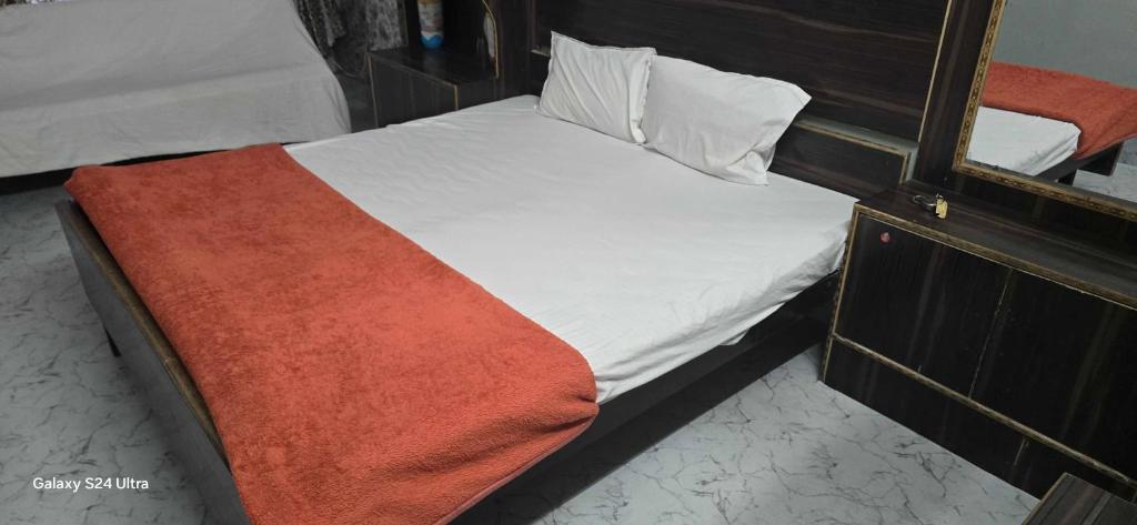 Ένα ή περισσότερα κρεβάτια σε δωμάτιο στο Hotel O Elysian