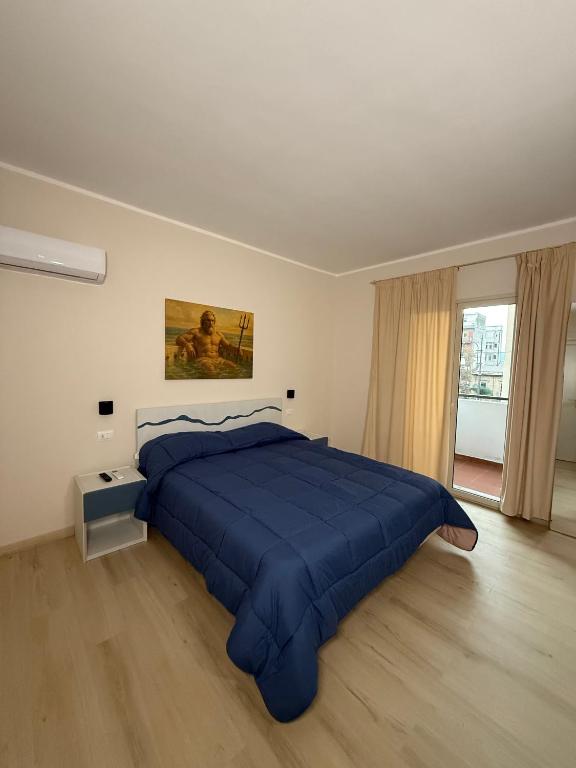 Una cama o camas en una habitación de La dimora degli Dei