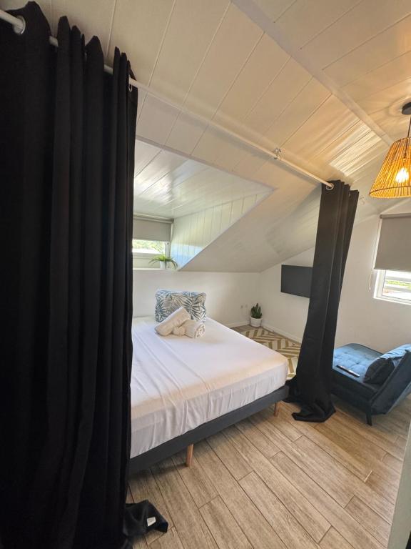 Ένα ή περισσότερα κρεβάτια σε δωμάτιο στο Villa Hana'iki