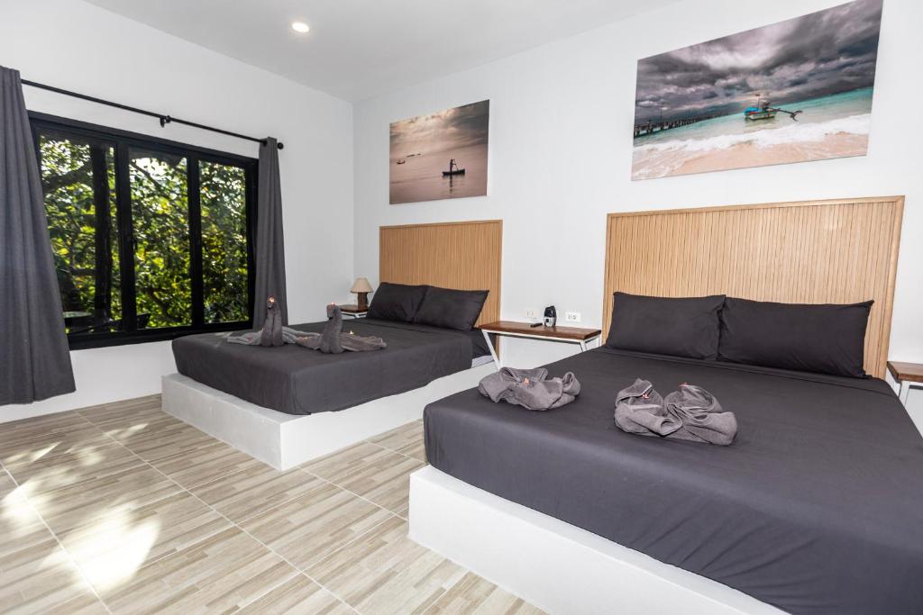 Кровать или кровати в номере Shiralea Resort