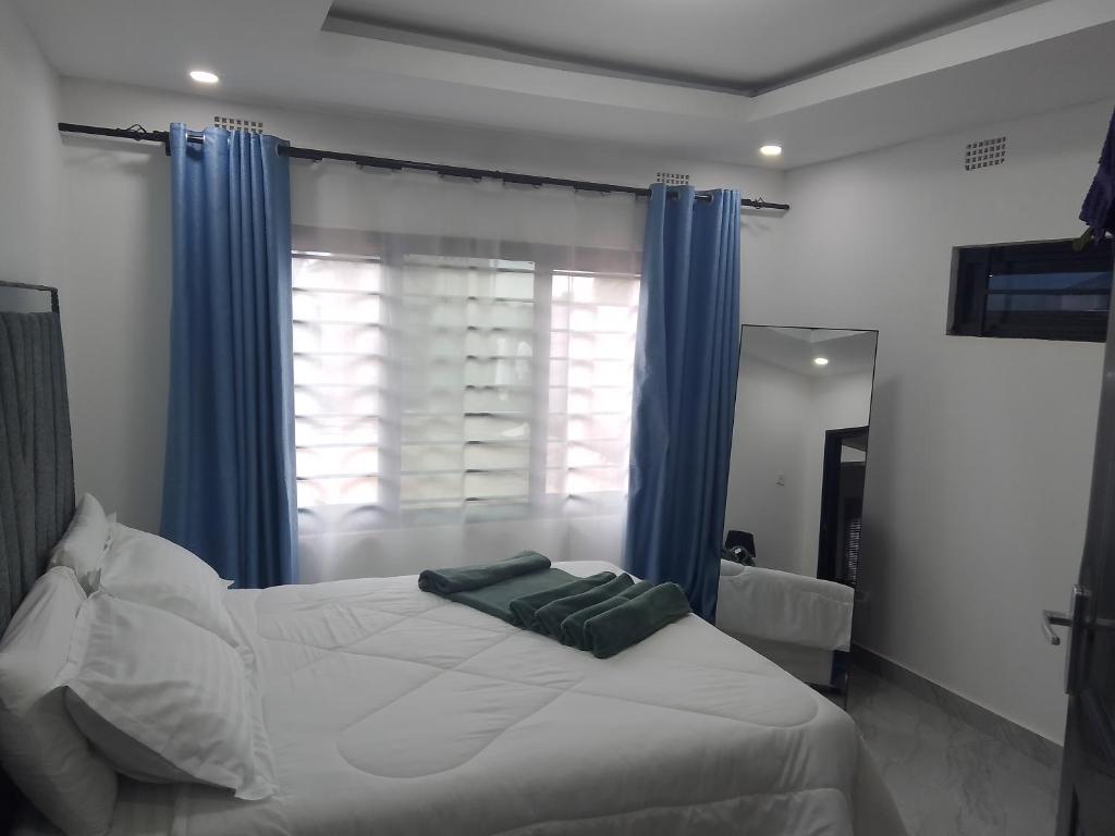 Postel nebo postele na pokoji v ubytování T&M apartments