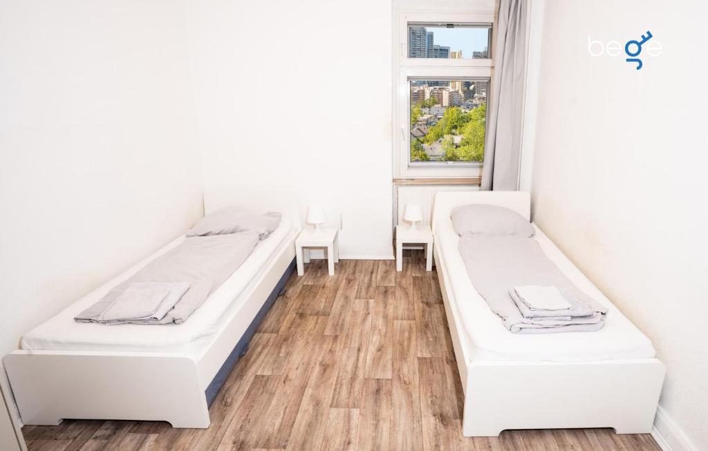 Postel nebo postele na pokoji v ubytování BEGE APARTMENTS StillSpace