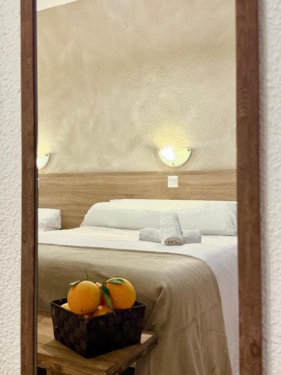 Ένα ή περισσότερα κρεβάτια σε δωμάτιο στο HS Altet Suites - Alicante Airport