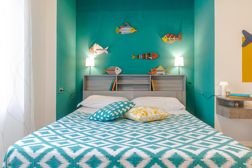 Ένα ή περισσότερα κρεβάτια σε δωμάτιο στο Casa Anita-relax e comodità