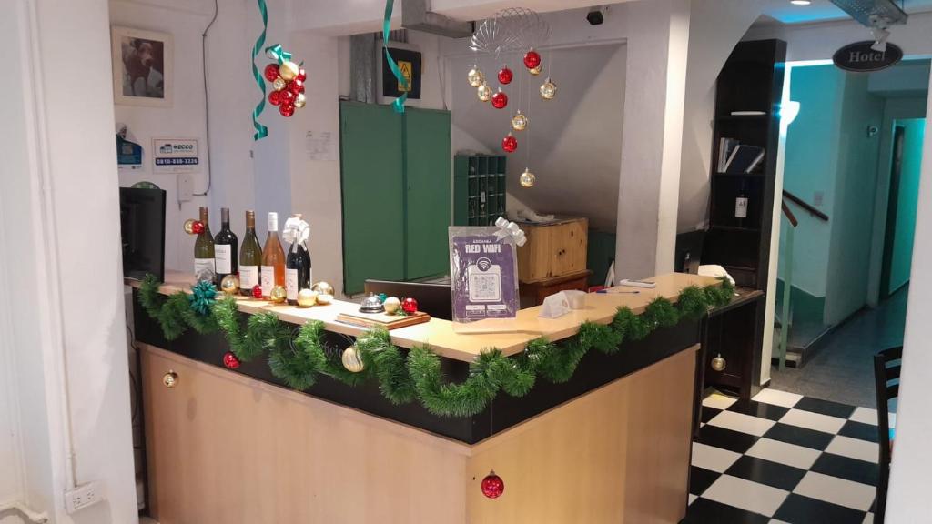 a counter with christmas decorations on it at HOTEL JUAN B JUSTO GARDEN Pet friendly in Mendoza