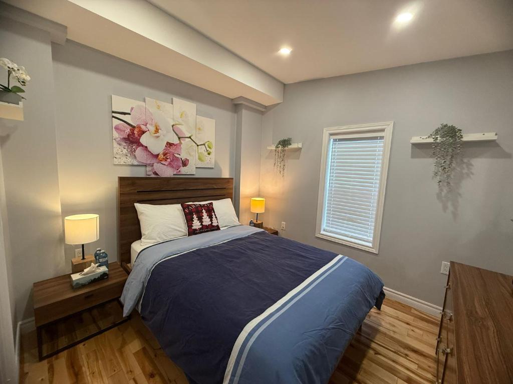 Кровать или кровати в номере Family Stay Near Niagara Falls