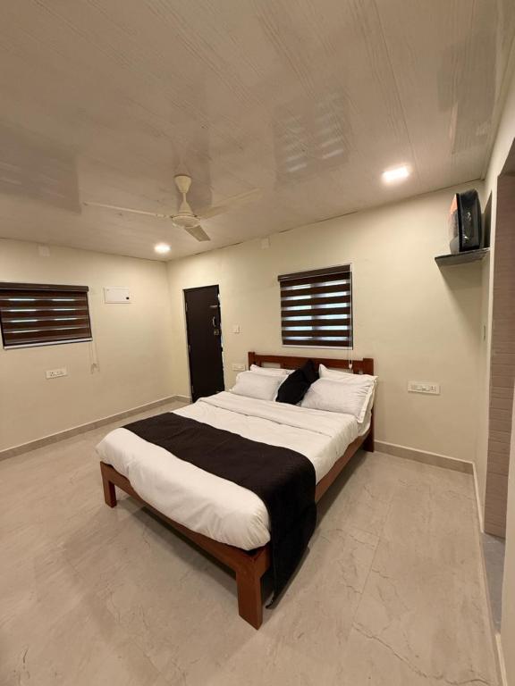 Giường trong phòng chung tại Tusker & Gaur - Bandipur