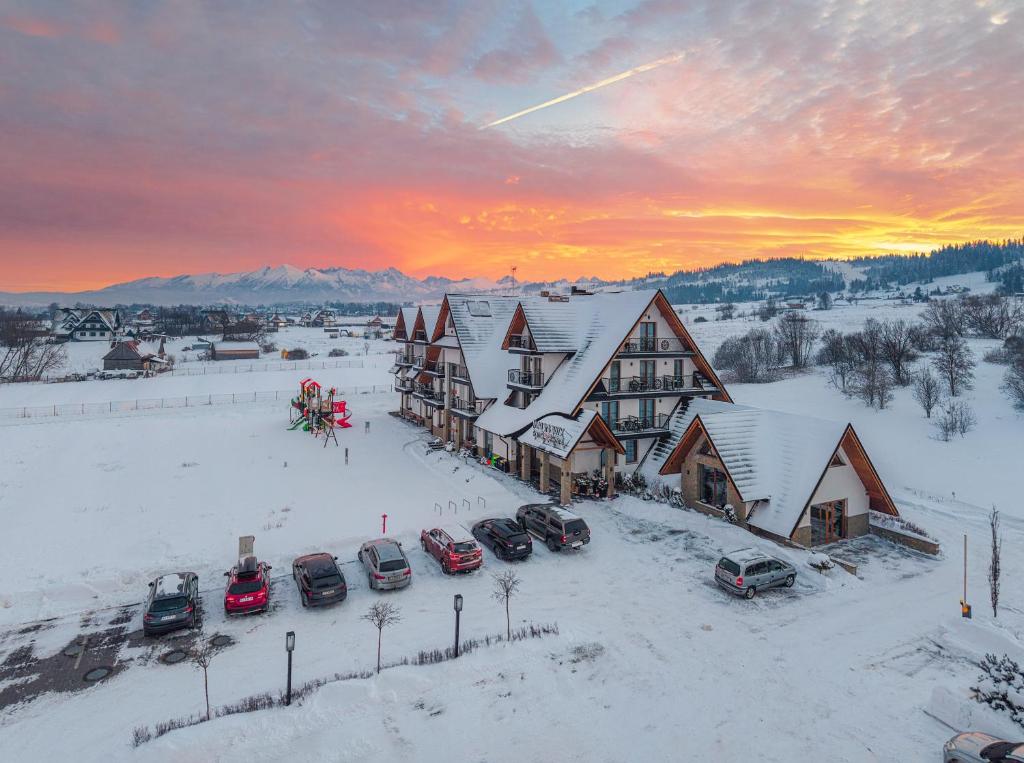 an aerial view of a lodge in the snow at Malinowy Potok in Białka Tatrzanska