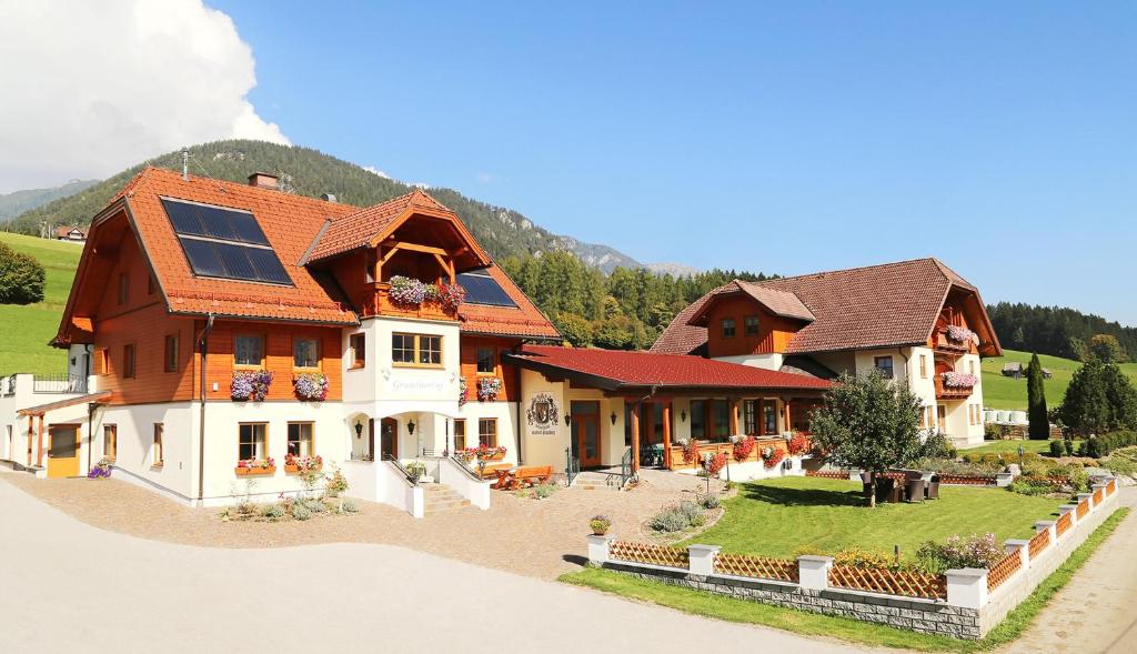 a house with solar panels on top of it at Grundnerhof in Birnberg