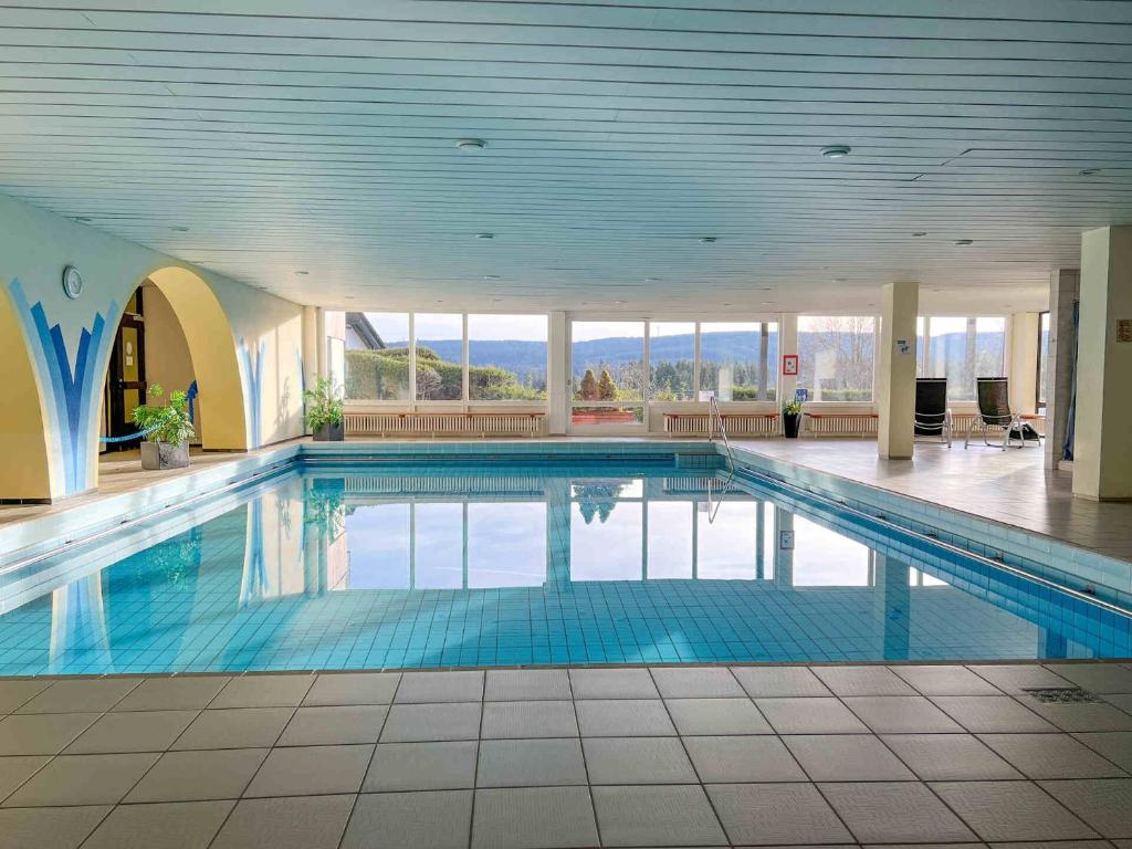 Swimmingpoolen hos eller tæt på Cosy Getaway mit Schwimmbad und Sauna