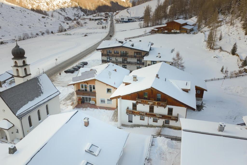 an aerial view of a village covered in snow at Mountain Lodge Obergurgl Ski In Chalet, opening Dec 25 in Obergurgl