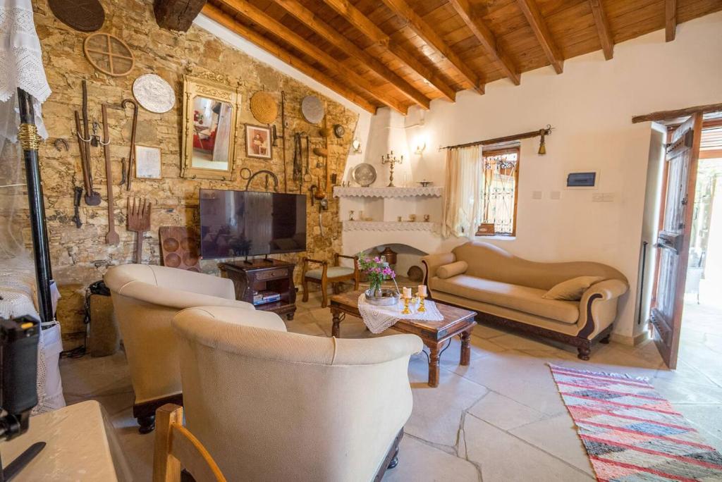 Posezení v ubytování Maison Des Vignes Lofou