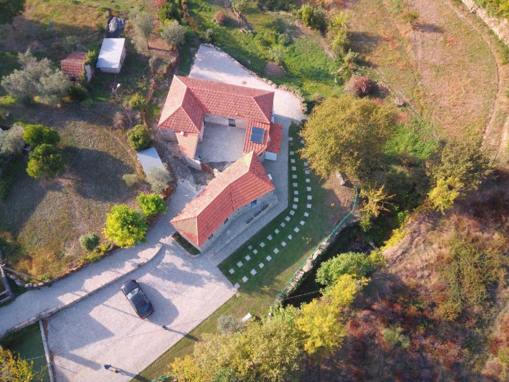 an overhead view of a house with a driveway at Casas da Travessoa in Marco de Canaveses