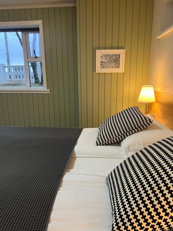 Rúm í herbergi á Thoristun Apartments