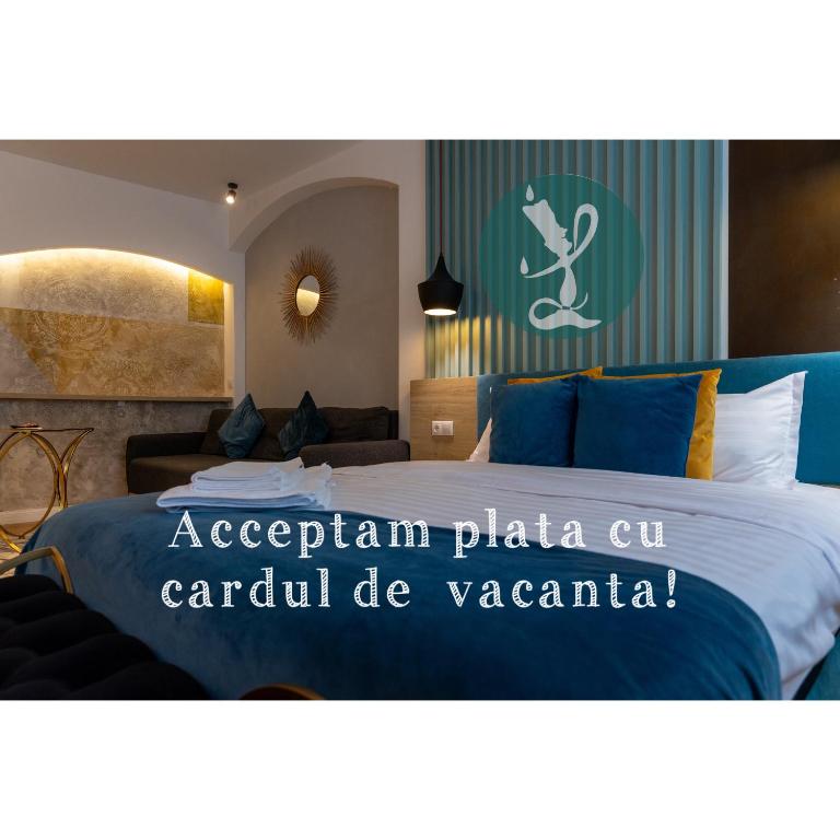 a hotel room with a bed with a sign on it at Lumiere House Sibiu in Sibiu