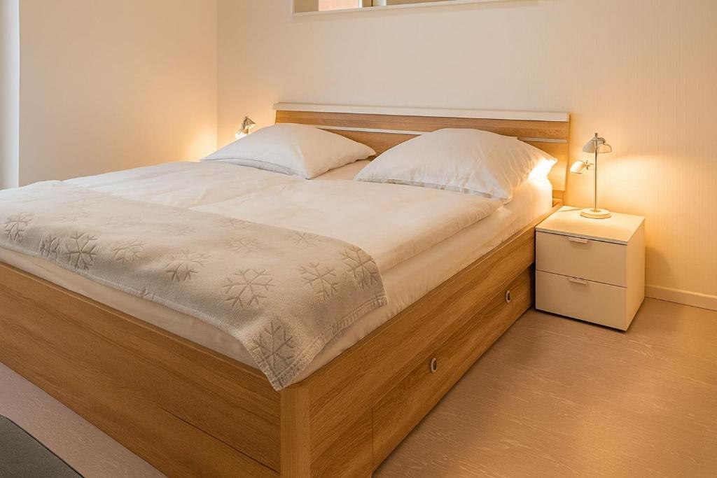 Postel nebo postele na pokoji v ubytování Apartment Warnemünde 15
